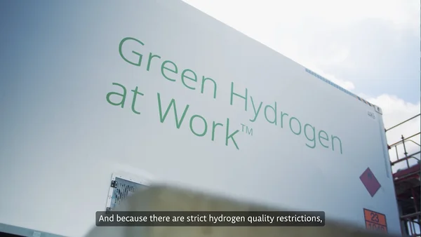 Green Hydrogen At Work writing on truck carrying hydrogen
