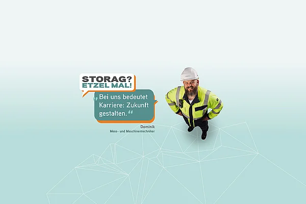 Dominik Messtechnik – Mann in Warnjacke und Helm mit Zitat